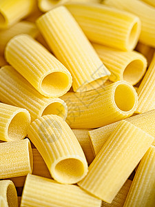 未经烹饪的意大利皮卡通尼意大利面糖类山脊食物碳水脊状化合物管子淀粉背景图片