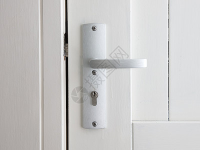 白色门 带铬锁孔入口房间内页安全金属房子财产门栓合金背景图片