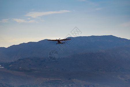小型降落伞飞机商业航空公司航班空气旅行航空翅膀螺旋桨飞行飞行员背景图片