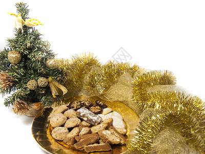 圣诞饼干在金盘上条款食物盘子美食星星背景图片