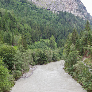 奥地利南部的阿尔卑斯山道隧道沥青国家绿色观光山脉公园通道风景背景图片