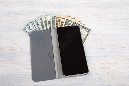 手机账单手机和白币美元货币的汇率美元展示网络细胞银行业技术屏幕经济现金收益贸易背景