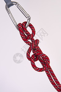 红色绳结危险登山扣高清图片