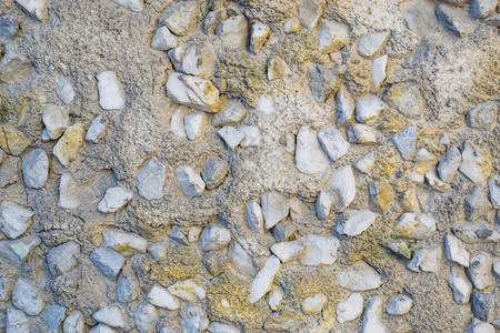 石膏中石头的质地绿色建筑风化建筑学水泥城市乡村棕色墙纸框架背景图片