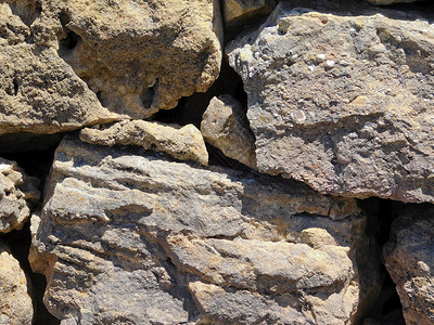 石头纹理砂岩石灰石岩石石方水平风化化石褐色痕迹石板背景图片