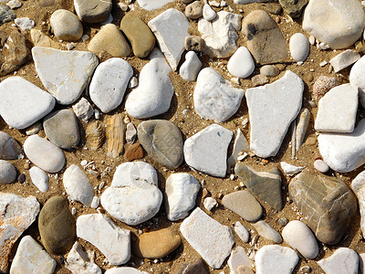 沙中的石头砂石沙子沙滩背景岩石水石海滩背景图片