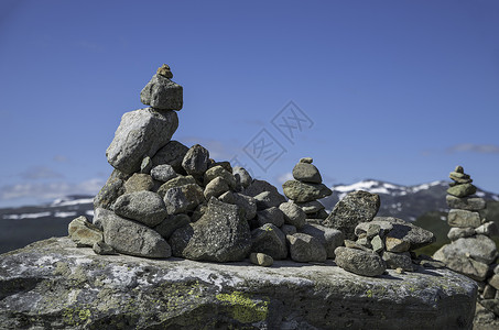 挪威开斋节一堆平衡的石头旅行旅游假期山脉峡湾岩石金字塔风景巨魔背景图片