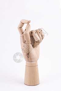 两只手指的手势 与一根木手相配合 用木手表示背景图片