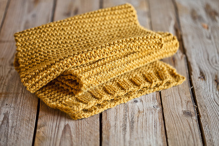 编织黄黄色围巾背景图片