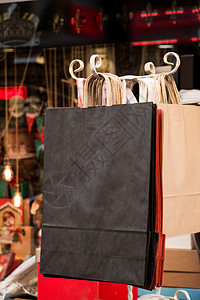 市场中一个简单的纸纸购物袋包装商品店铺零售礼物回收销售购物背景图片