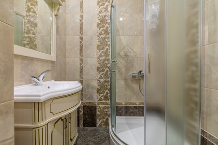 淋浴机舱和水槽局限奢华棕色镜子房间淋浴白色公寓龙头褐色背景图片