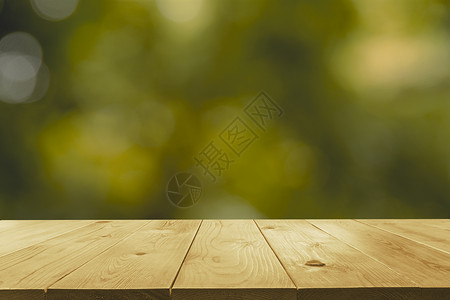 绿色自然抽象背景模糊的空木桌墙纸柜台场地地面公园木板展示剪辑季节叶子背景图片