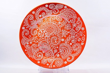 用手画的装饰陶瓷盘 手工制作乡村框架古董风格工艺制品桌子圆圈陶器盘子背景图片