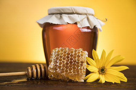 梳子里甜甜的蜂蜜 玻璃罐治愈营养金子甜点蜂巢液体国家花蜜玻璃石匠背景图片