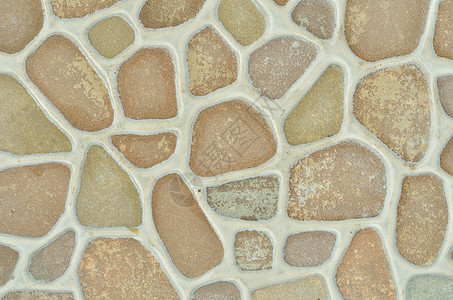 质地是圆形石头马赛克瓷砖背景图片