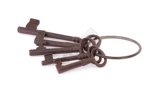 戒指上的古董钥匙历史性怀旧宏观安全古铜色金属背景图片