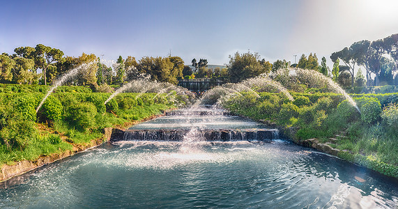 意大利罗马欧洲区的采样喷泉 意大利罗马石头路面民众吸引力树木花园季节公园瀑布城市背景图片