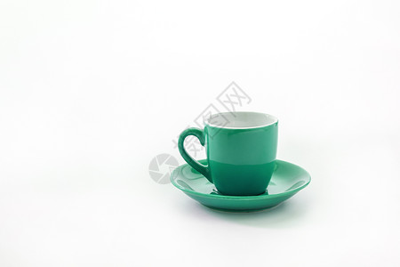 白色背景上隔绝的杯盘和茶碟饮料咖啡厨房早餐盘子厨具陶瓷餐具淡绿色家庭背景图片