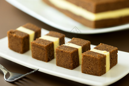 巧克力奶酪层蛋糕蛋糕图层食物面包烘烤甜点背景图片