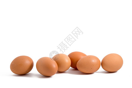 棕色鸡蛋白背景的连续六个鸡蛋背景
