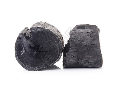 白背景上的木炭粒子煤炭活力烧伤木头工作室黑色材料资源煤球背景图片