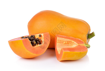 白色背景的木瓜种子食物甜点黄色热带饮食橙子水果高清图片