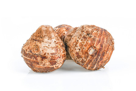 白色背景上孤立的 taro root农业蔬菜水果情调异国棕色食物热带植物块茎背景图片