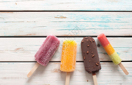各种冰球橙子冰棒木头冰淇淋甜点巧克力广告覆盆子食物小吃背景图片