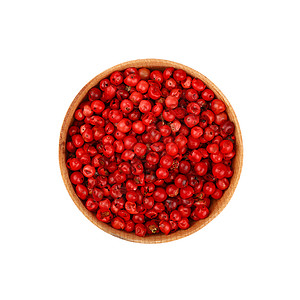 盛满粉红辣椒玉米的木碗香料味道尺寸胡椒调味品白色玫瑰粉色红色棕色背景图片