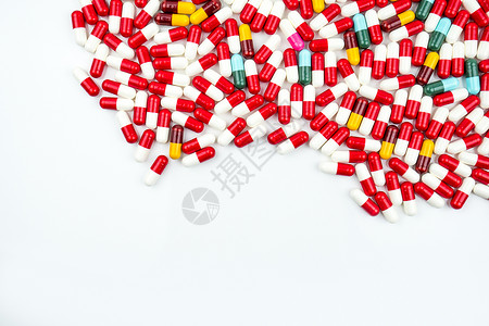 医药学校素材五颜六色的抗生素胶囊药片在白色背景下与复制空间分离 耐药性概念 抗生素用药具有合理的全球保健理念 医药行业 药房背景工作室药品疾背景