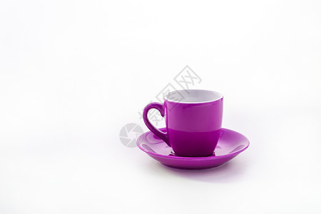 白色背景上隔绝的杯盘和茶碟紫丁香厨具盘子橙子餐具饮料食物陶瓷淡绿色紫色背景图片