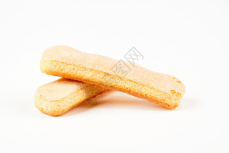 两个饼干棕色面包食物垃圾糕点沙漠香草饮食孩子们黄色背景图片