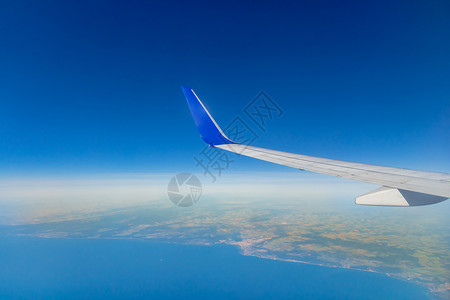 海陆空运输图片空中飞机机翼飞越海陆空背景