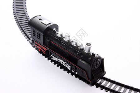 铁路上的玩具机车背景图片