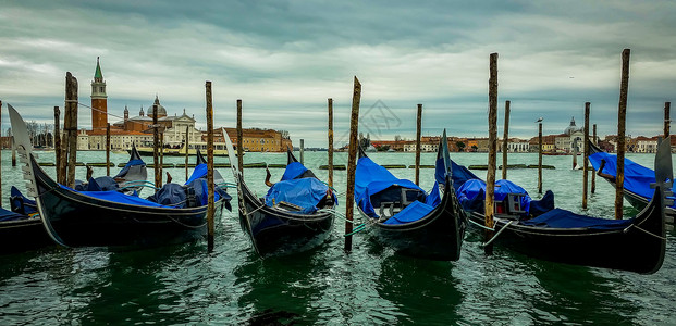 威尼斯的歌多拉斯旅游吊船船夫港口时间纪念碑全景照片码头城市背景图片