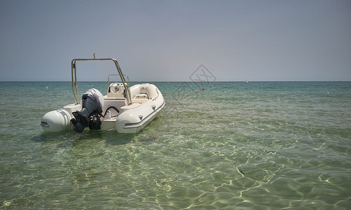 海边的摩托艇放松救援海滩旅行冥想波浪小船小艇汽艇旅游背景图片