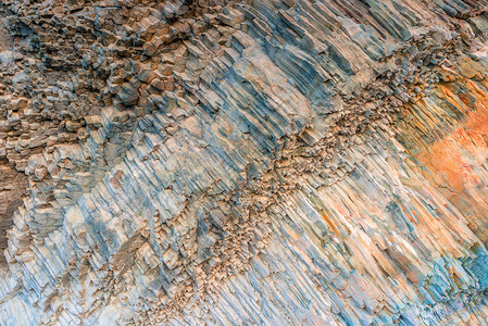 棱镜表面岩石表面以六边形特写的形式结冰的熔岩背景