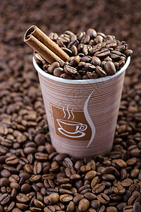 咖啡豆味道咖啡味饮料烘焙品种咖啡肉桂玻璃豆子棕色背景图片