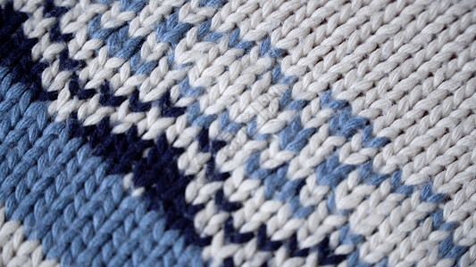 暖和羊毛毛衣的纹理纤维纺织品棉布衣服编织材料工艺背景图片