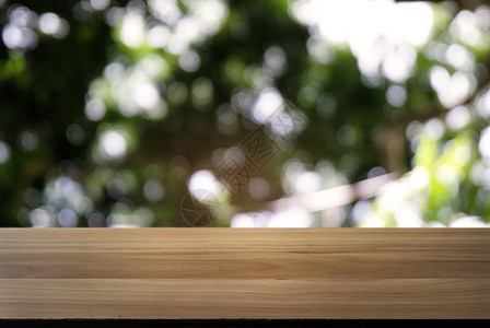 抽象模糊背景前的深色木桌图像产品木头乡村墙纸太阳公园花园展示木板柜台背景图片