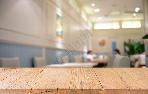在抽象模糊bokeh背面的空暗黑木桌前g木头展示广告咖啡店铺厨房餐厅柜台酒吧桌子背景图片