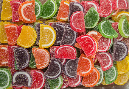 柠檬形状 美味的糖果和糖果食物孩子小吃庆典背景图片
