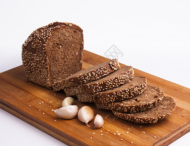 黑色多重黑面包烘烤木板向日葵食物芝麻饮食杂粮白色背景图片