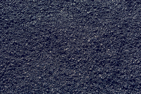 沥青纹理新的沥青焦油抽象纹理或背景粒状木炭水平街道车道砂砾碎石路面材料黑色背景