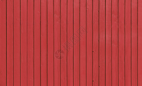 带平行木板的木栅栏 涂有红漆高清图片