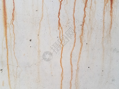 褐色或红生锈 滴在灰水泥墙下腐蚀滴水液体工业水泥灰色背景图片