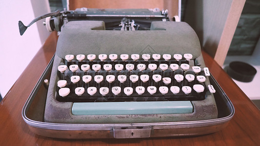 状况良好的旧打字机机 没有纸张供货金属商业床单钥匙古董作家评书机器故事笔记背景图片
