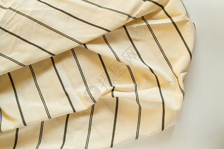 Beige 带有黑色条纹的比格线织布 纤维的纹理贸易缝纫床单批发纺织品材料羊毛棉布宏观面料背景图片