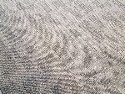 地面或地板上的灰色地毯或垫子背景图片