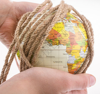 以绳子包裹着的环球盟誓世界行星学习绳索教育教学背景图片